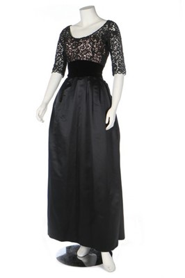 Lot 254 - A John Cavanagh couture black satin evening...