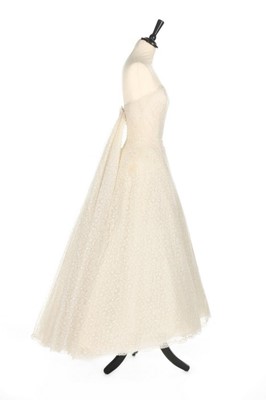 Lot 106 - A Givenchy couture white Chantilly lace bridal...