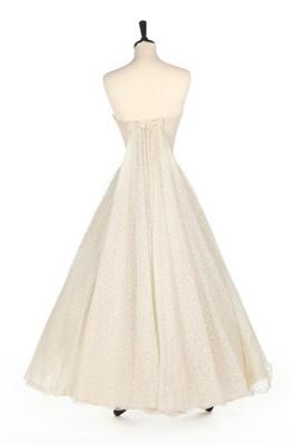 Lot 106 - A Givenchy couture white Chantilly lace bridal...