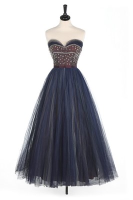 Lot 120 - A Jacques Heim couture beaded tulle ball gown,...