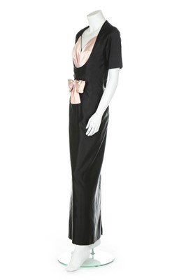 Lot 138 - A Maggy Rouff couture black satin evening gown,...