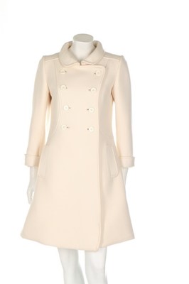 Lot 178 - An André Courrges ivory double faced wool coat,...