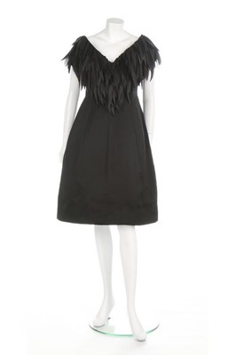 Lot 190 - A Jacques Griffe couture black satin cocktail...