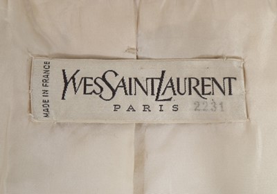 Lot 142 - An Yves Saint Laurent couture white matelassé...