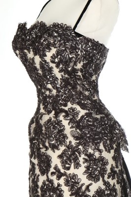 Lot 143 - A Carven couture black soutache lace cocktail...