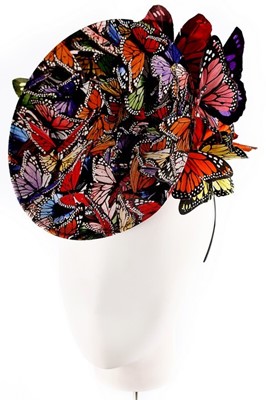 Lot 328 - A Philip Treacy painted feather 'butterfly'...