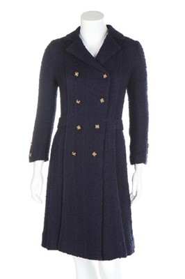Lot 153 - A Chanel couture navy bouclé coat-dress, late...