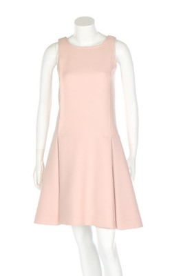 Lot 175 - An André Courrèges baby-pink wool mini dress,...