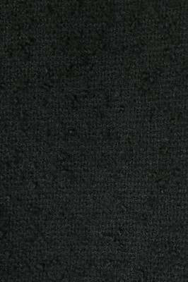 Lot 170 - A Balenciaga couture black bouclé wool suit,...