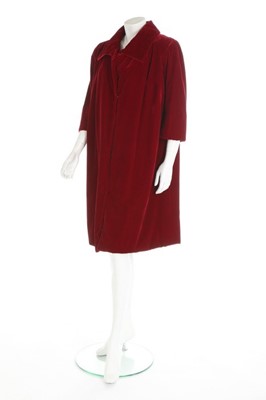 Lot 147 - A Balenciaga couture wine velvet tent coat,...