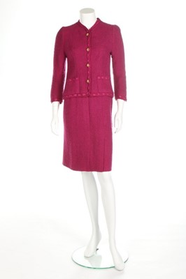 Lot 228 - A Chanel couture magenta tweed suit,...