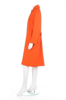 Lot 237 - An André Courrèges orange wool coat, circa...