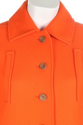 Lot 237 - An André Courrèges orange wool coat, circa...