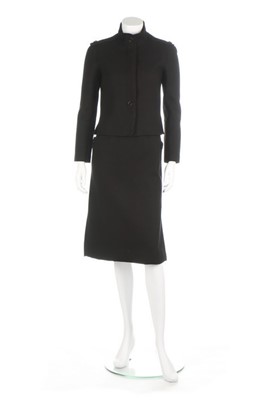 Lot 223 - An André Courrèges black wool suit, circa 1970,...