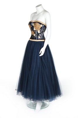 Lot 259 - A Pierre Balmain couture midnight-blue tulle...