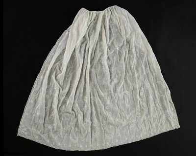 Lot 32 - A whitework embroidered muslin apron, English,...