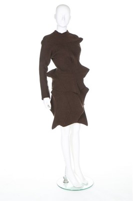 Lot 313 - An Issey Miyake brown knitted wool ensemble,...