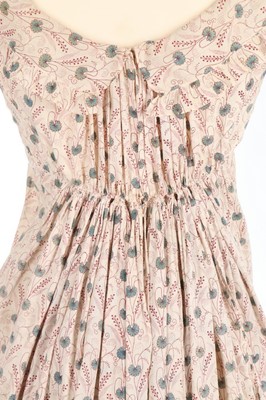 Lot 40 - A printed cotton day dress, circa 1825, roller-...