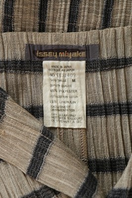 Lot 319 - An Issey Miyake pleated and striped...