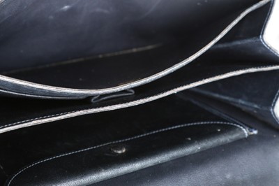 Lot 69 - An Hermès black leather handbag, 1960s,...
