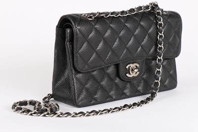 Lot 2 - A Chanel quilted black caviar leather 2.55 bag,...