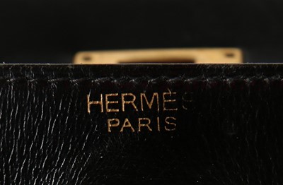 Lot 7 - An Hermès black leather Kelly bag, 1960s,...