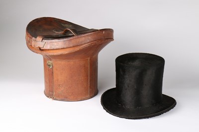 Lot 41 - A gentleman's black beaver stove pipe hat in...