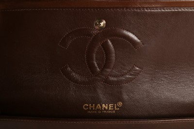 Lot 4 - A Chanel brown quilted leather 2.55 bag, 1980s,...