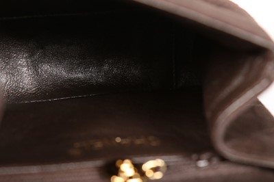 Lot 5 - A Chanel dark brown suede evening bag, 1990s,...