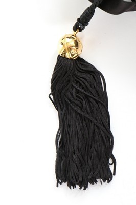 Lot 3 - A Chanel black satin ribbon mini-bag, 1990s,...