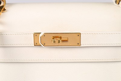Lot 23 - An Hermès off-white leather Kelly bag, 1991,...