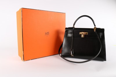 Lot 20 - A good Hermès black leather Kelly bag, 1992,...