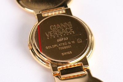 Lot 16 - A Gianni Versace gold plated wrist watch,...