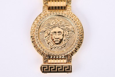Lot 16 - A Gianni Versace gold plated wrist watch,...