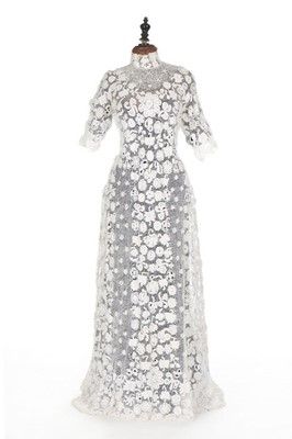 Lot 46 - An Irish crochet bridal gown and matching coat,...