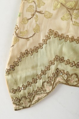 Lot 58 - A Callot Soeurs embroidered ivory satin...
