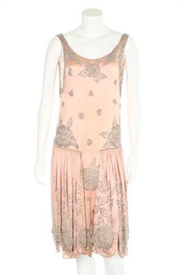 Lot 68 - A pink satin flapper dress, circa 1926,...