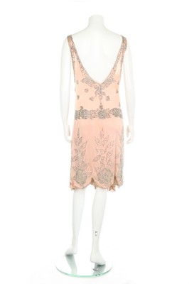 Lot 68 - A pink satin flapper dress, circa 1926,...