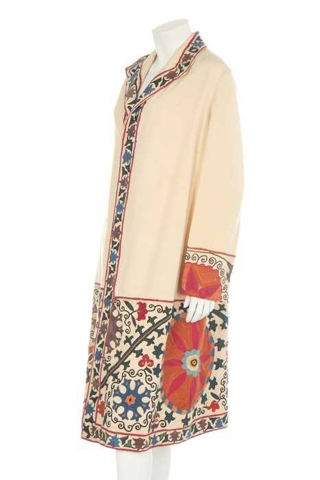 Lot 61 - An ivory silk summer coat made from a Central...