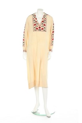 Lot 61 - An ivory silk summer coat made from a Central...
