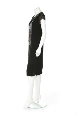Lot 82 - A Jean Patou couture beaded velvet dress,...