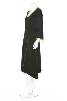 Lot 79 - A Paul Poiret couture black cotton velvet...