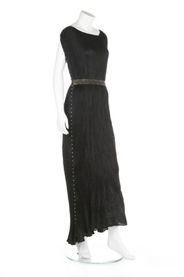 Lot 73 - A Mariano Fortuny black silk Delphos gown,...