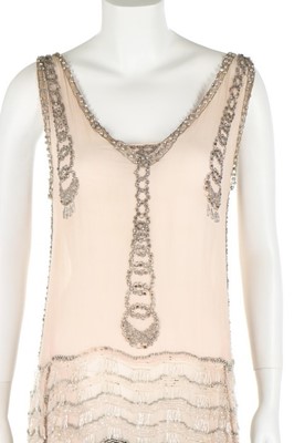 Lot 77 - A couture beaded pale pink chiffon 'flapper'...