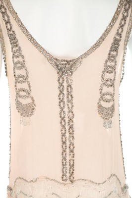 Lot 77 - A couture beaded pale pink chiffon 'flapper'...