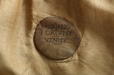 Lot 71 - A Mariano Fortuny gold stencilled blue velvet...