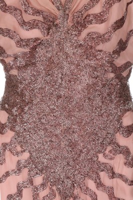 Lot 85 - An haute couture beaded bias-cut pink chiffon...