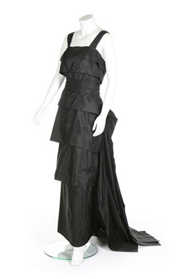 Lot 105 - An Edward Molyneux couture black taffeta...