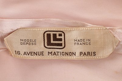 Lot 95 - An early Lucien Lelong couture pink satin bias...