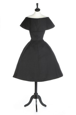 Lot 110 - A Christian Dior couture black satin cocktail...